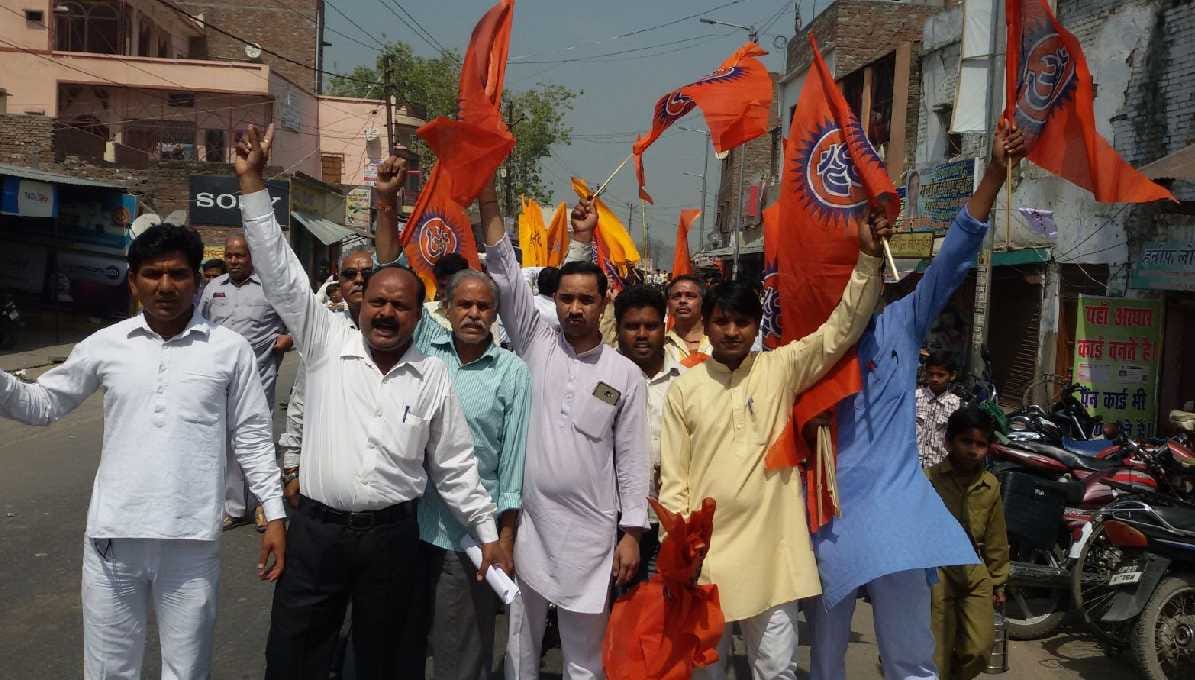 Best wishes to the Revolutionary, waving saffron flag