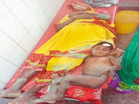 Wall collapses, three injured including mother and son