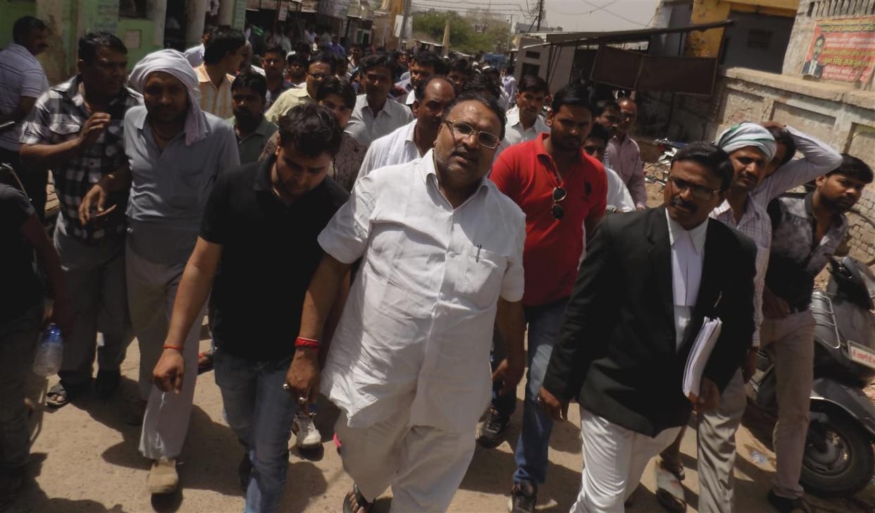 Former MLA Devendra surrenders murder accused