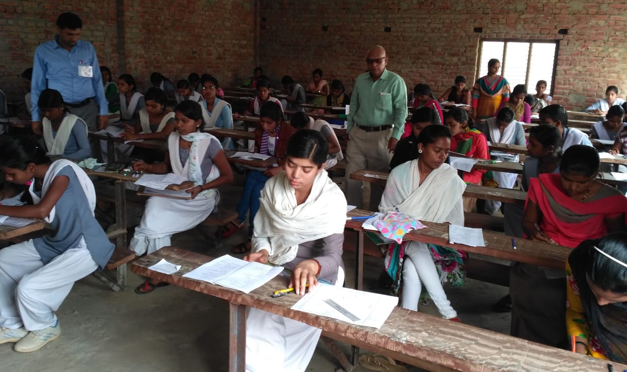 Collective copy on two centers in board examination 