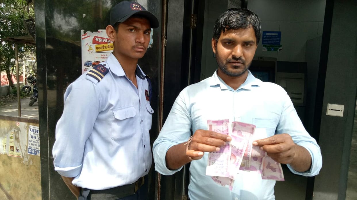 10,000 exempt from ATM, the young man stared at the notes