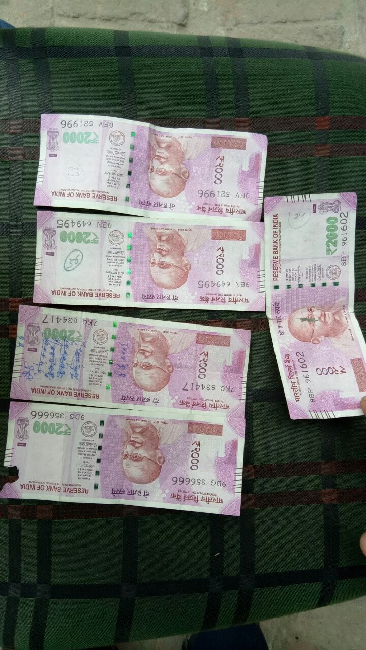 10,000 exempt from ATM, the young man stared at the notes