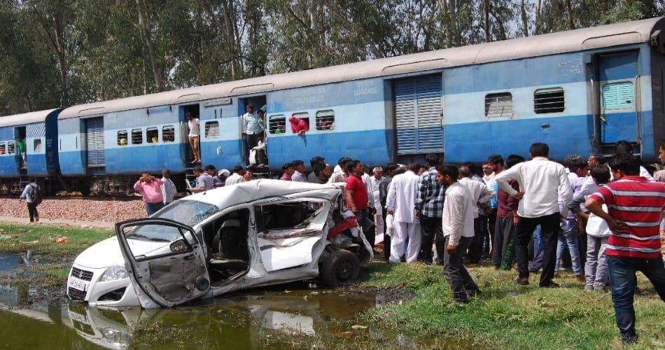 train collides with car