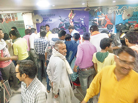 To take advantage of huge discounts in bikes, crowds in showrooms