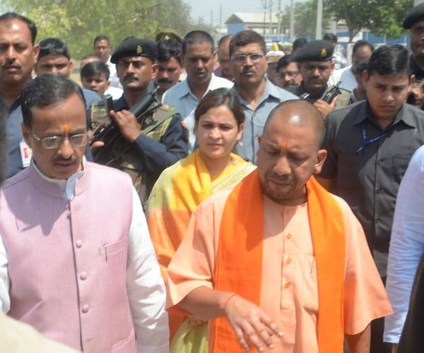 Adityanath says to minister to work according to plan.
