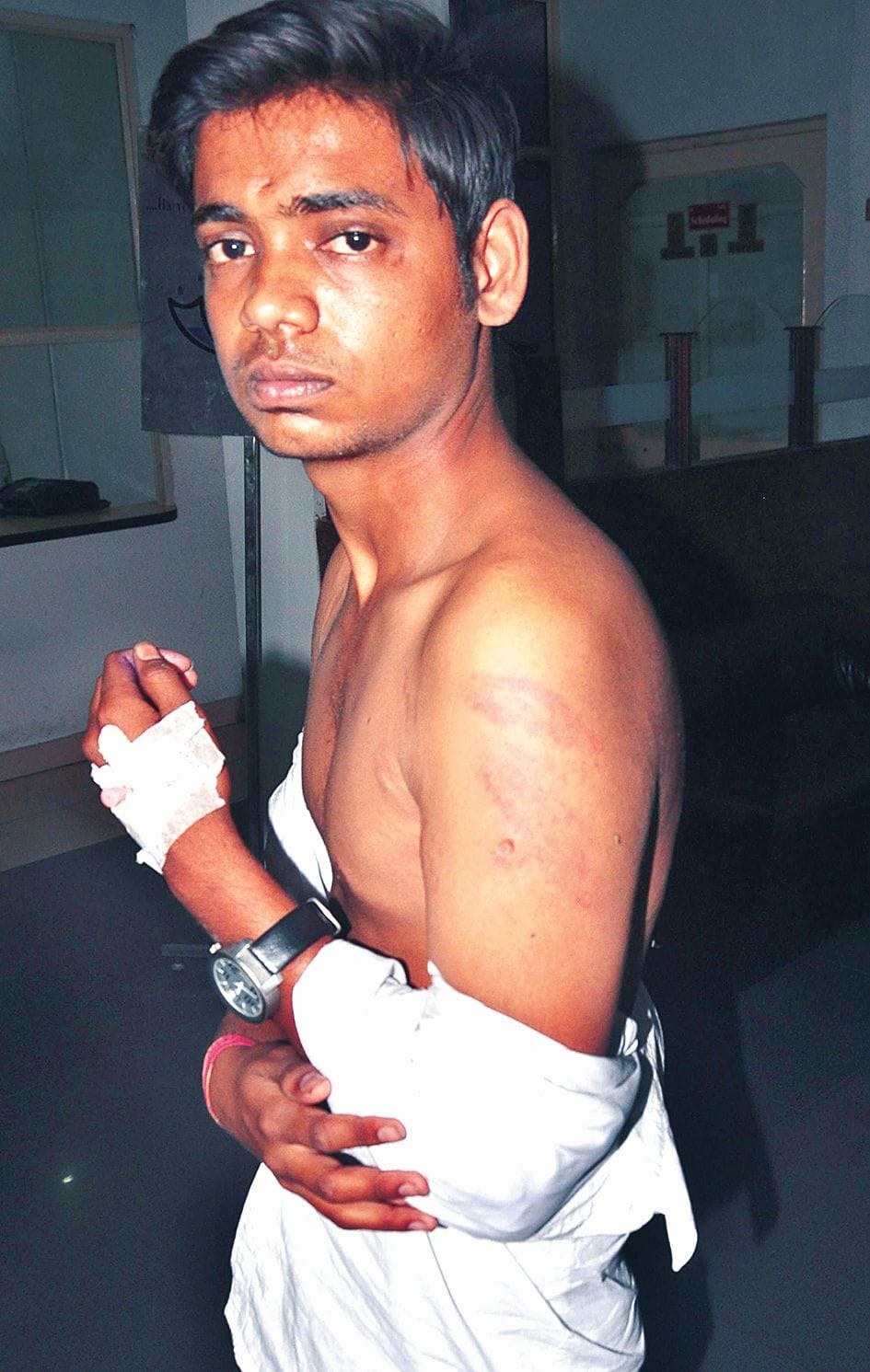 Beaten students for not giving copy money