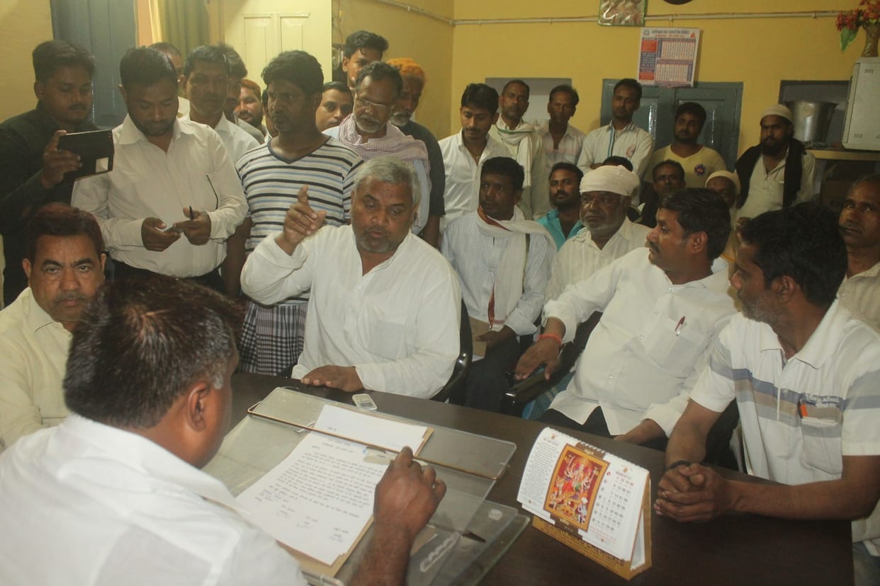 Meat businessmen surrounded the  chairman