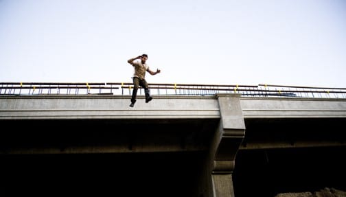 Jump from the bridge to avoid the police