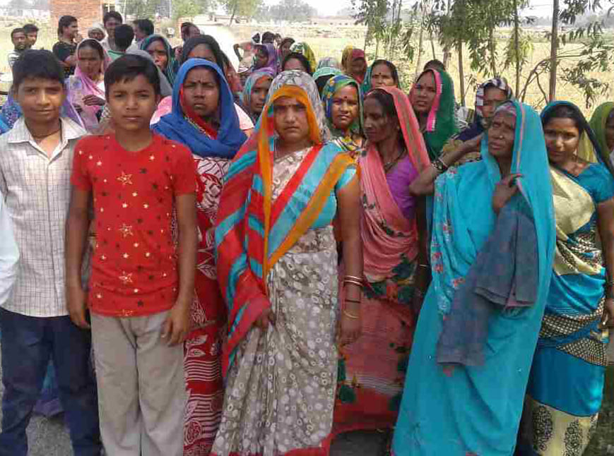 The villagers on the street against the liquor shop 