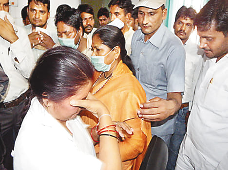 Rowdy Nurse whispering the minister after lying on hold