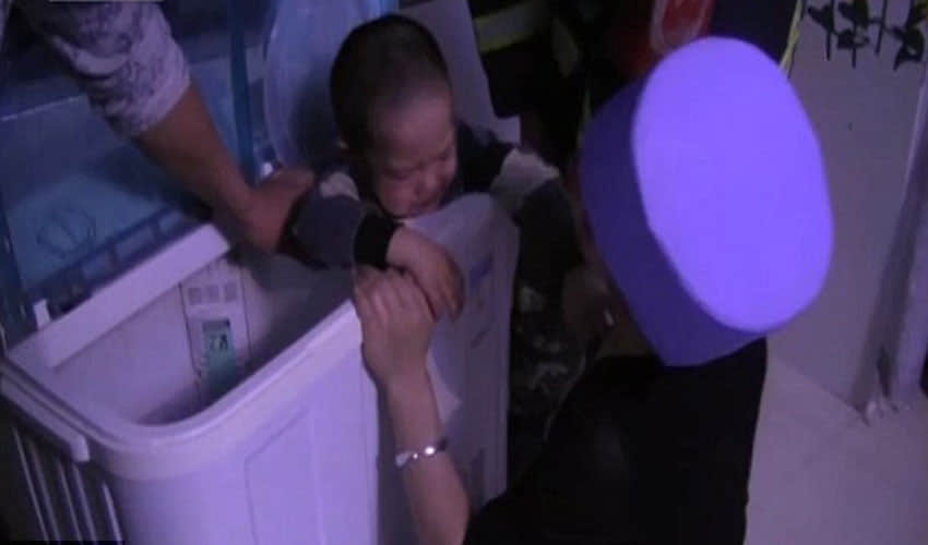 3-year-old girl rescued from a washing machine