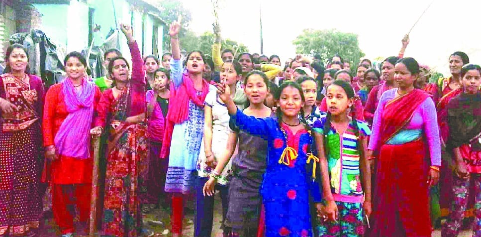 Women on the streets taking scorpion grass in hand against alcohol