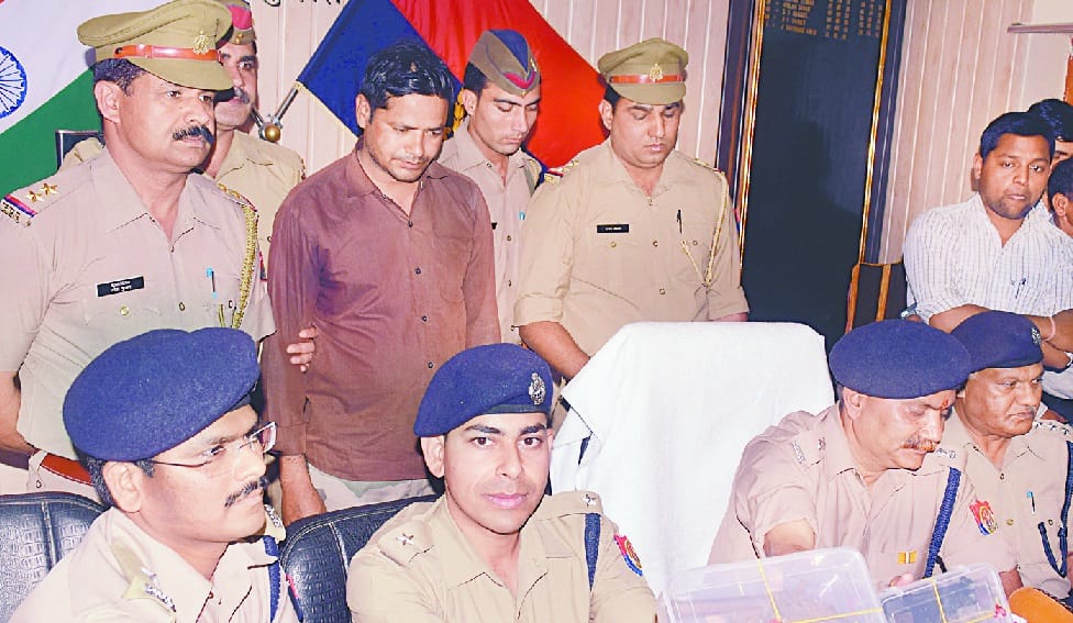 Head Master of the School, weapons dealer, network spread across several districts of UP