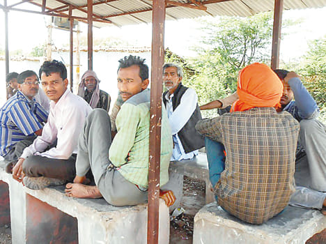 Trickster collides with truck driver, son injured