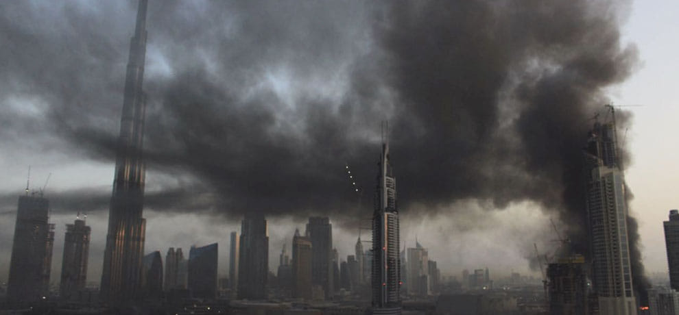 fire catches in construction building near Burj Khalifa in dubai