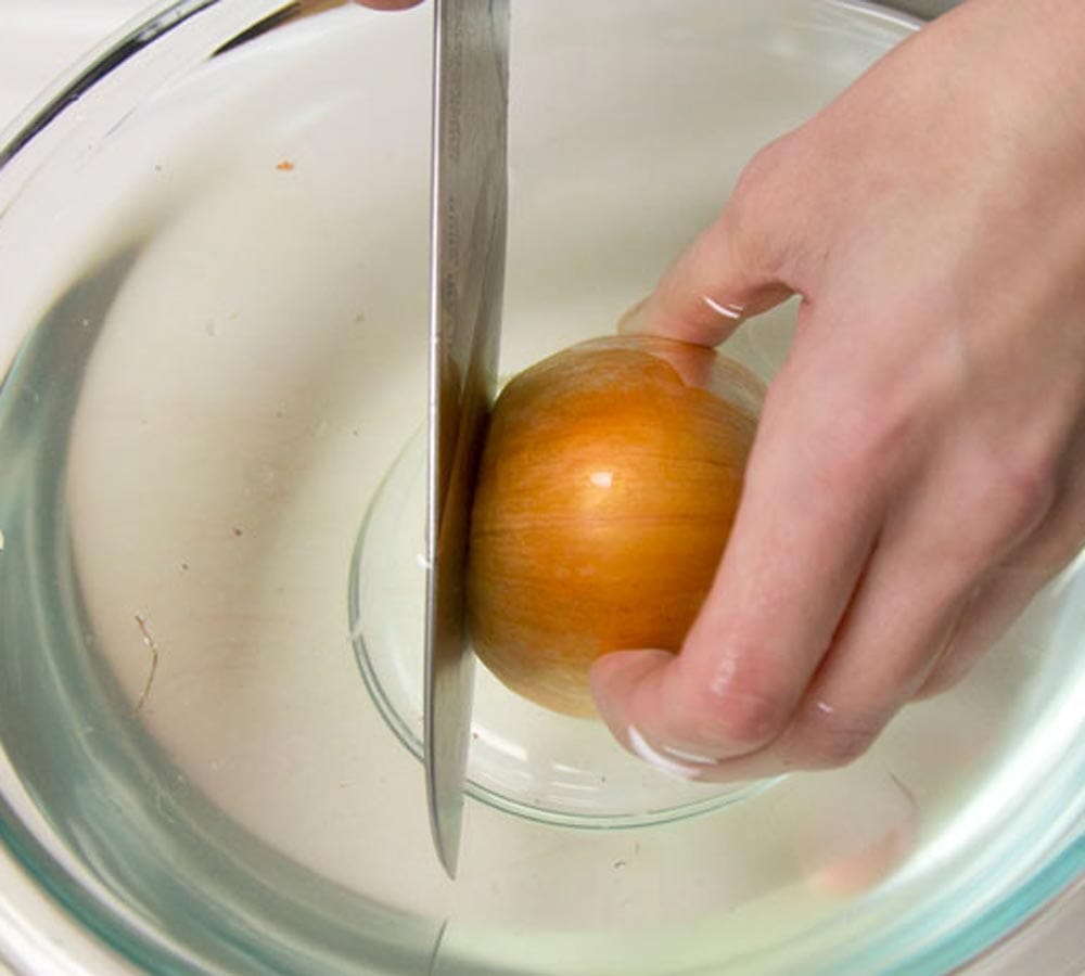 how to stop tears during onion cutting