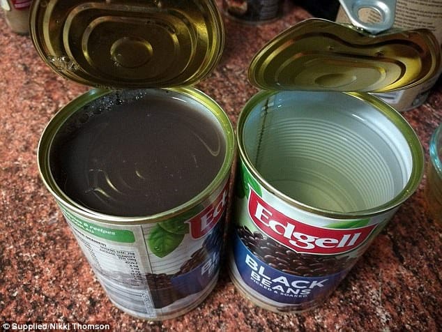 Woman opens a can of beans to find just ONE floating inside.
