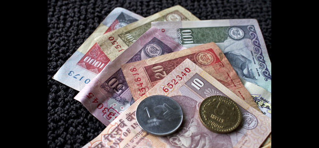 when coins or rupee falls from pocket get these auspicious signs