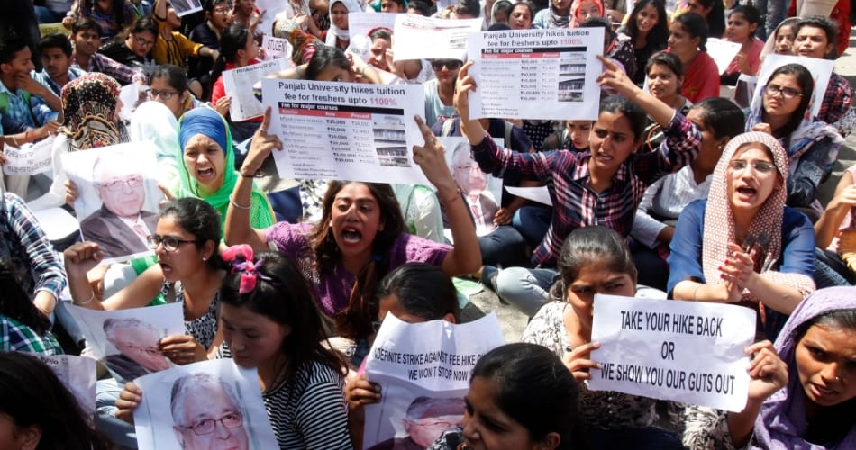 girl students clash with police on road at punjab university chandigarh due to fee increament