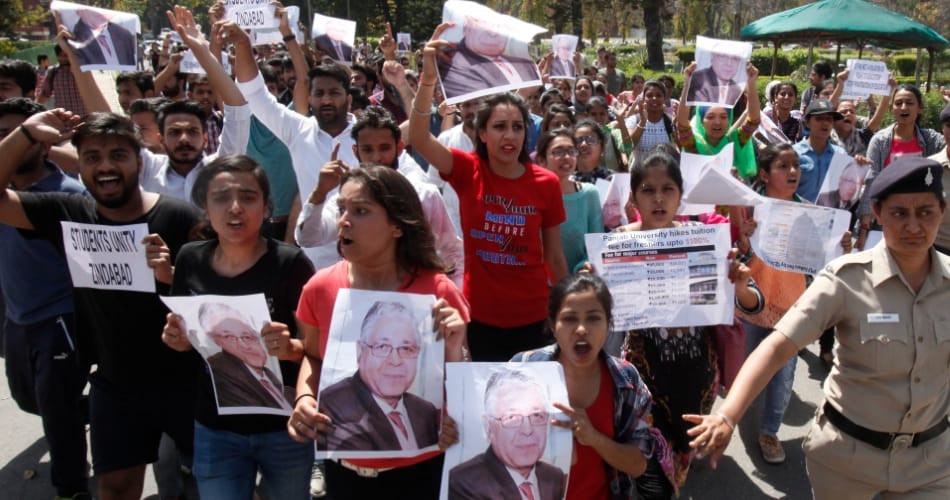 girl students clash with police on road at punjab university chandigarh due to fee increament