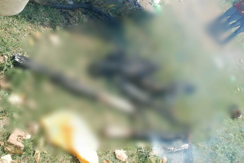 police taken half burned dead body under custody for investigation in sitapur
