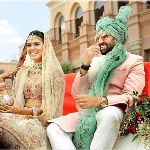 Amitabh Bachcan & Abhishek Bachchan Attend Wedding In Abu Dhabhi, Aishwarya Was Missing