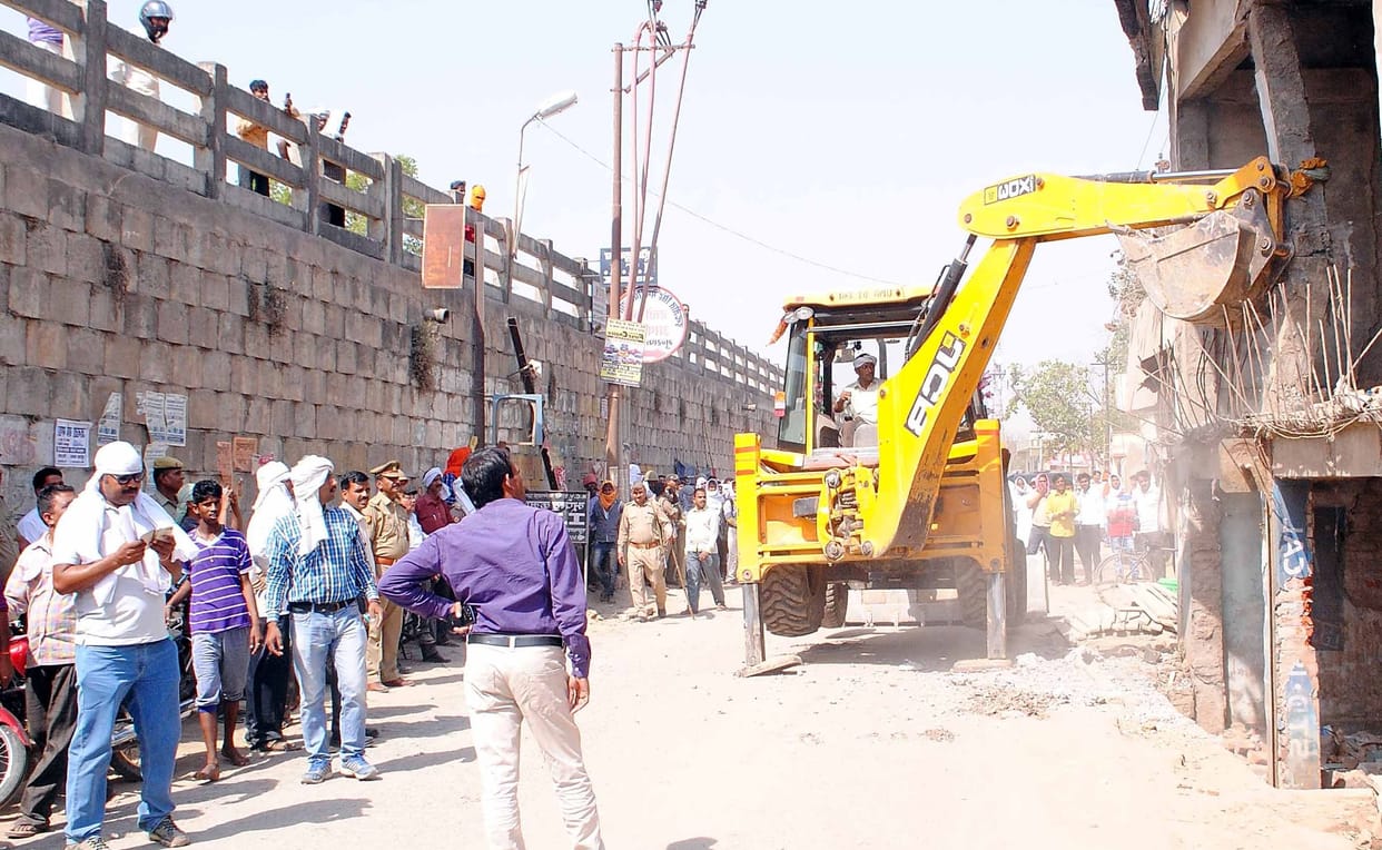 Demolished homes and shops