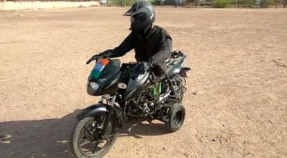 local mechanic made a robot who rides bike