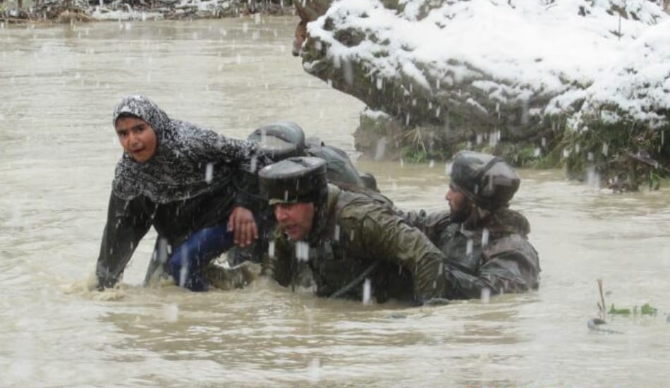 security PERSONNEL SAVING PEOPLE FROM FLOOD IN VALLEY