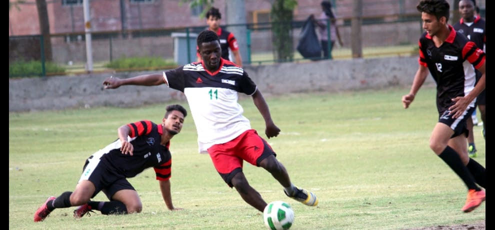 African and indian students played football match in noida