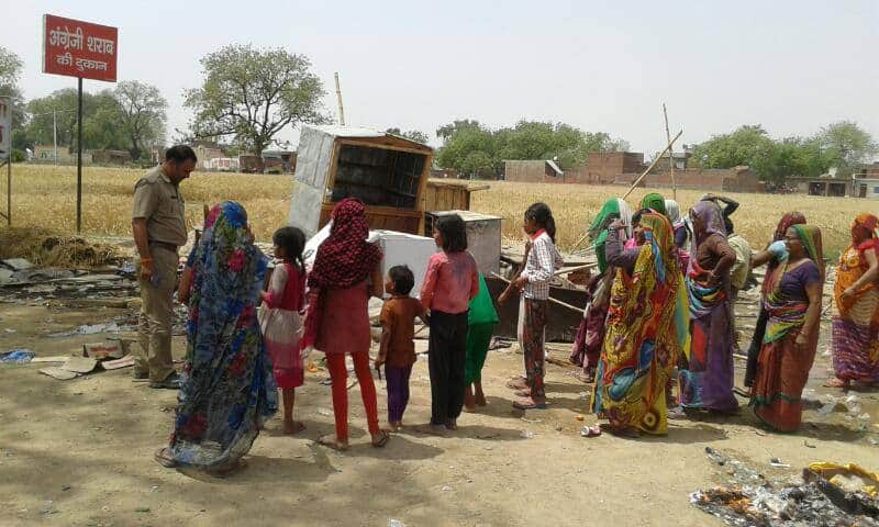 demolition of women at liquor shop