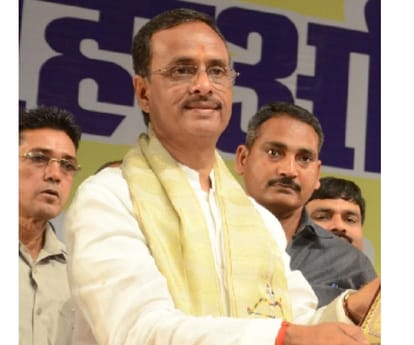 deputy chief minister dinesh sharma in a PWD programme.