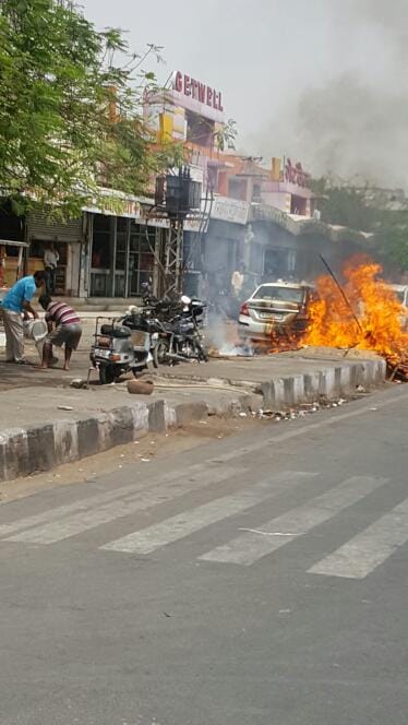 a fire out in a car at jln marg jaipur
