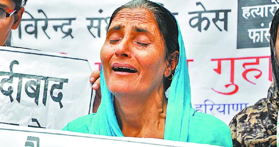 old mother protest for justice to dead son virendra killed by INLD leader's son in panchkula