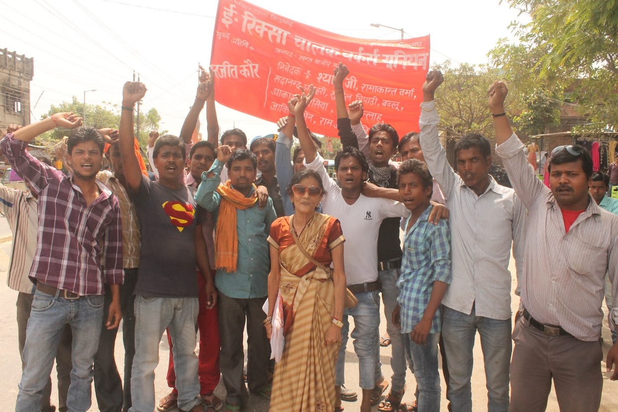  E-rickshaw drivers perform in municipality office