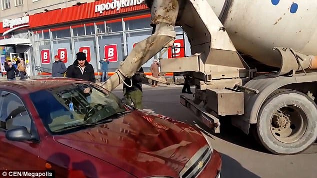 Furious husband fills wife's car with cement after she legally changed her surname 