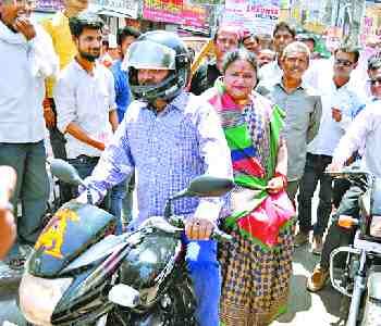 mininster Anupama, who came out of the bike