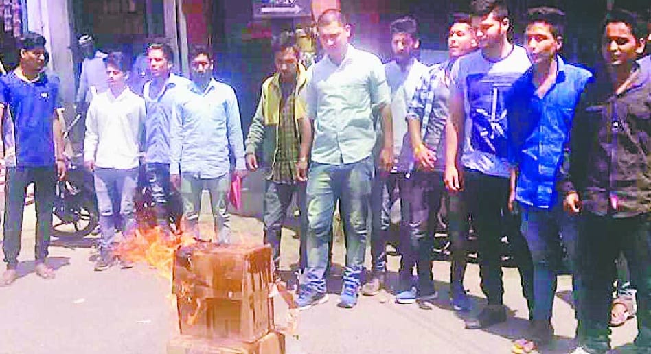 Hijam workers blow the effigy of Mamta Banerjee