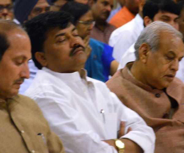  Ministers sleeping in chief minister adityanath programme.