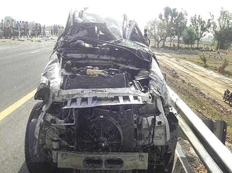 Tire bursts upside down, driver dies