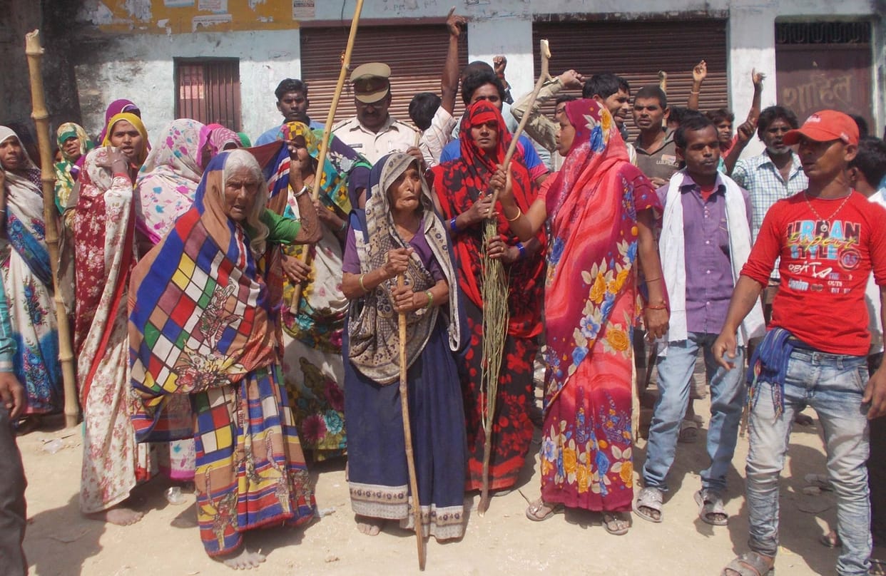Women on the road turning off liquor shops