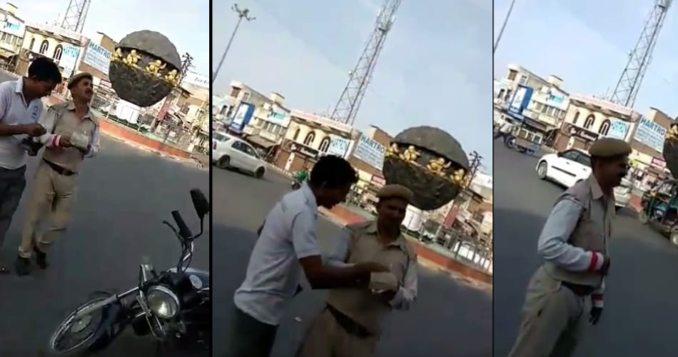 Traffic Police Man Taking Bribe and Hiding in Uniform, Photos Viral