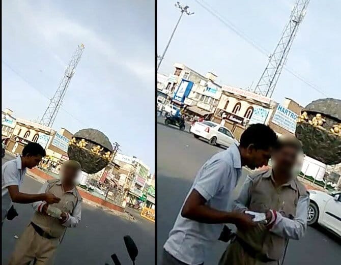 Traffic Police Man Taking Bribe and Hiding in Uniform, Photos Viral