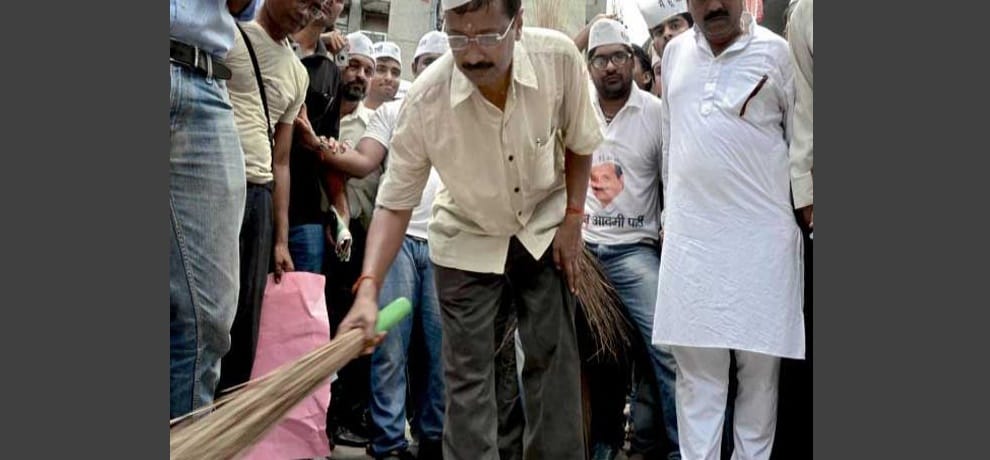 arvind kejriwal aam aadmi party release poster with broom for mcd polls