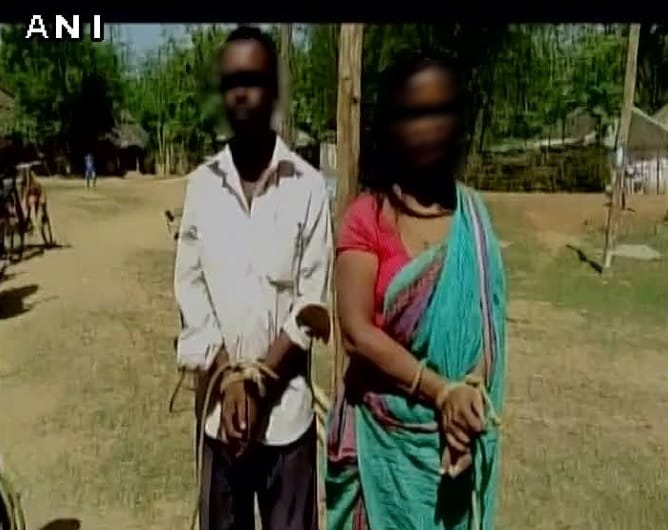 man and woman thrashed and tied by villagers due to illicit relationship