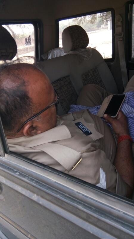 UP Police: UP 100 policeman caught sleeping in their jeep 