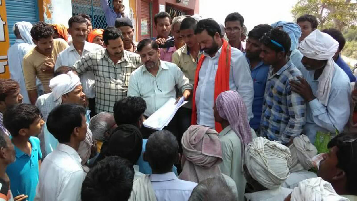 Farmers protest against back employees, accuse