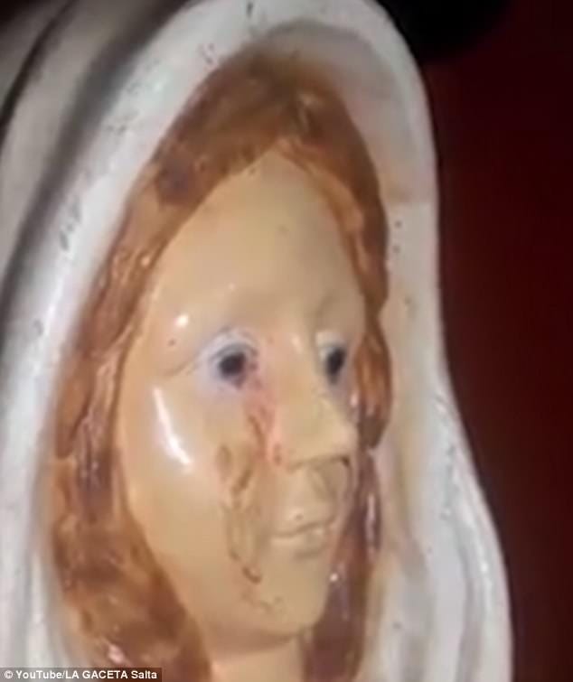'witness a miracle after a statue of the Virgin Mary begins crying BLOOD' 
