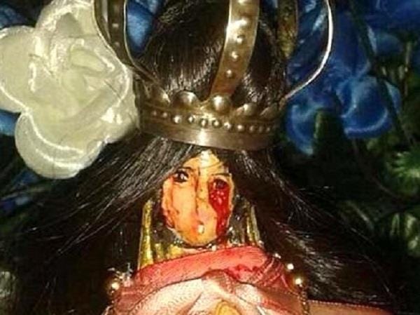'witness a miracle after a statue of the Virgin Mary begins crying BLOOD' 
