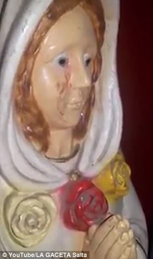 'witness a miracle after a statue of the Virgin Mary begins crying BLOOD' 